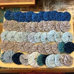 Handmade vintage Fabric Yo-Yo Quilt Pieces, total of 50!